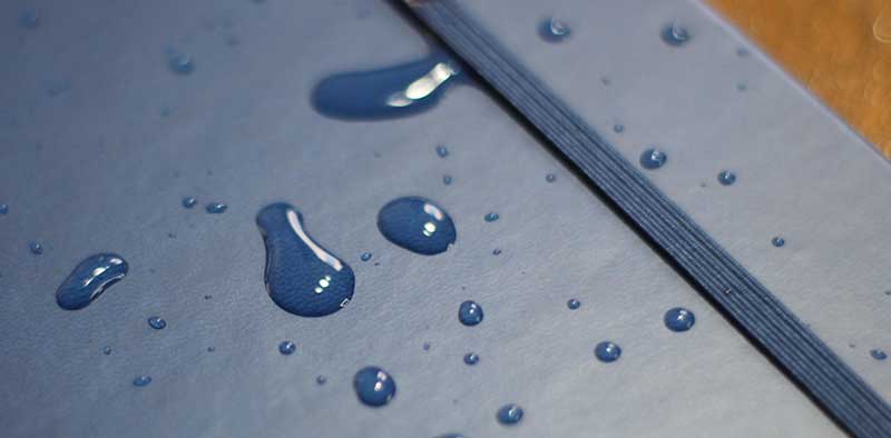 water resistant journal cover VS non-waterproof notebook cover comparison photo